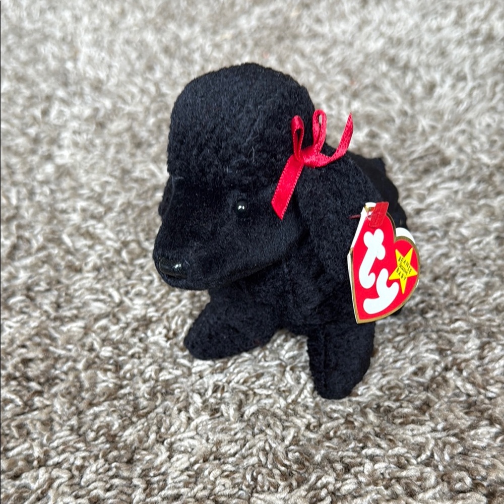 Black Plush Dog with Red Bow

Ty Beanie Babies Gigi The Poodle